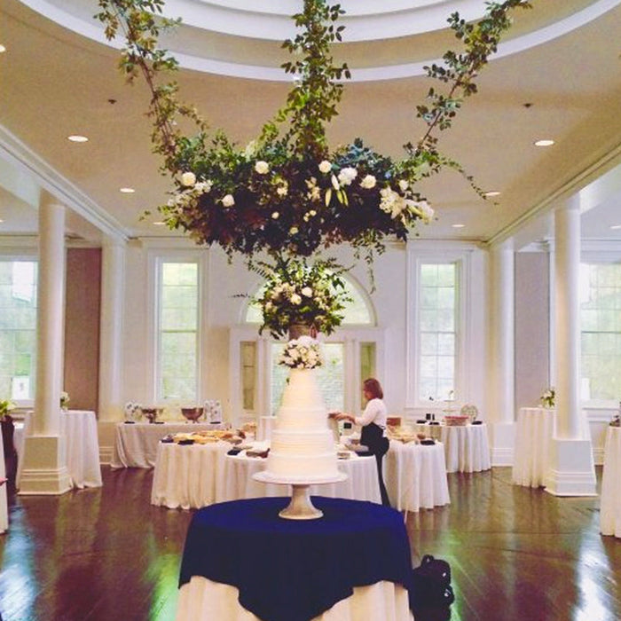 Grand floral chandelier wreath installation